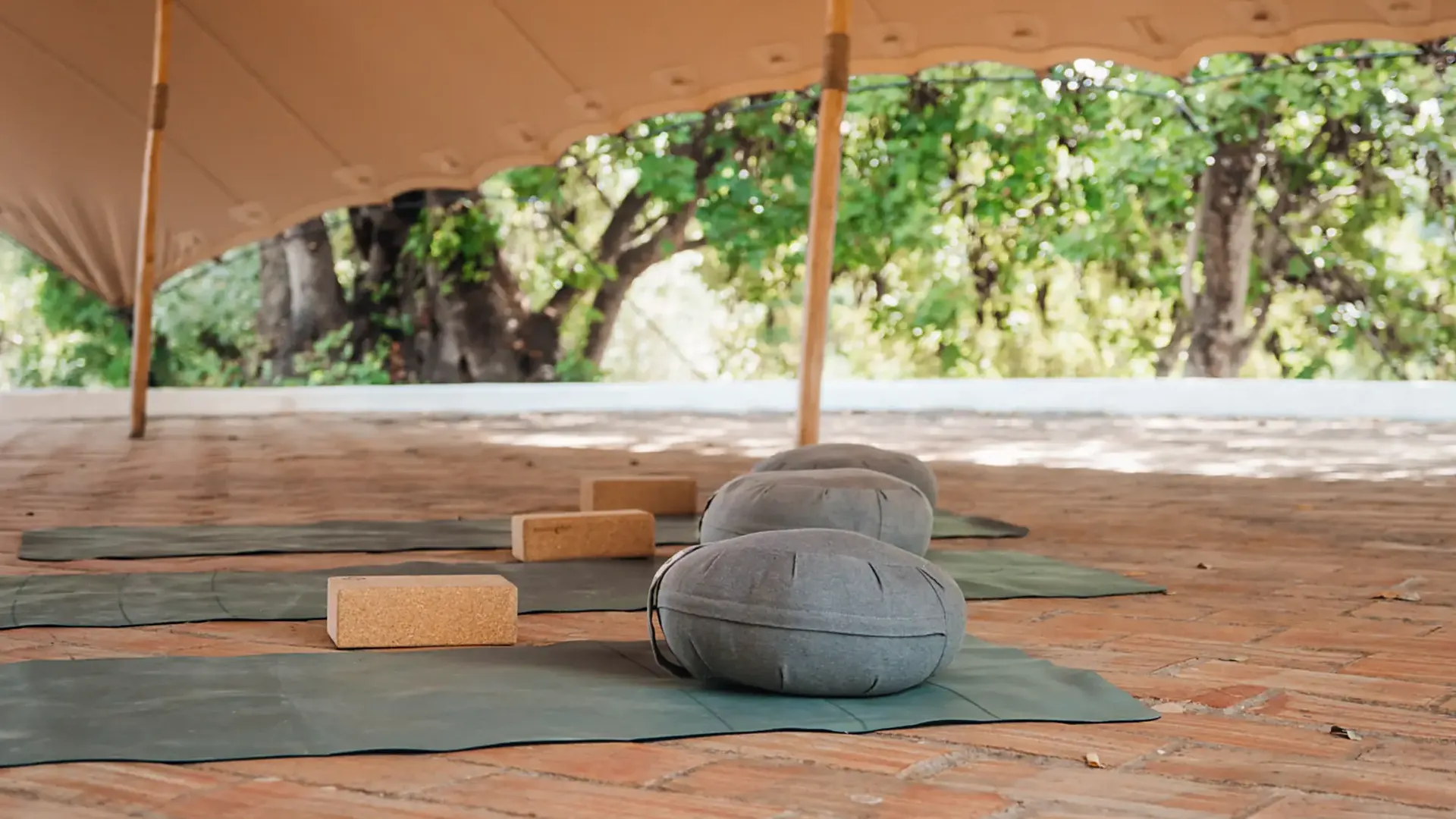 Shaded yoga canopy on the terrace at Solar Alvura, looking out over the Algarve countryside